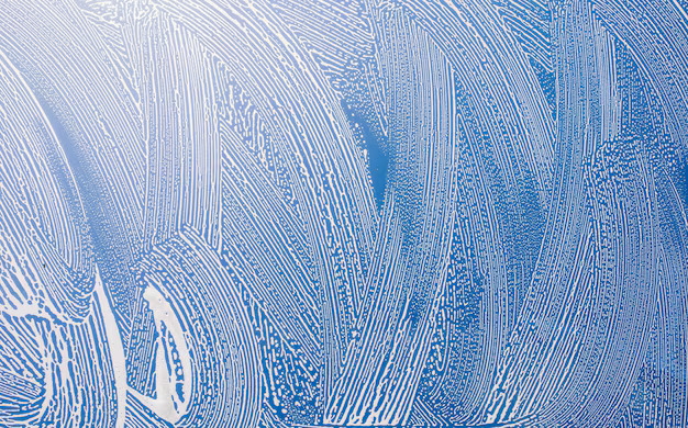 Textured blue soap bubbles background